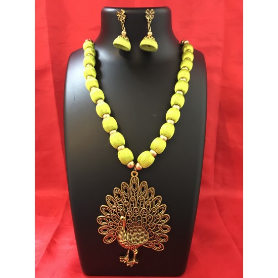 Light Green  colour silk thread jewellery set with peacock locket 