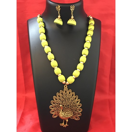 Light Green  colour silk thread jewellery set with peacock locket 